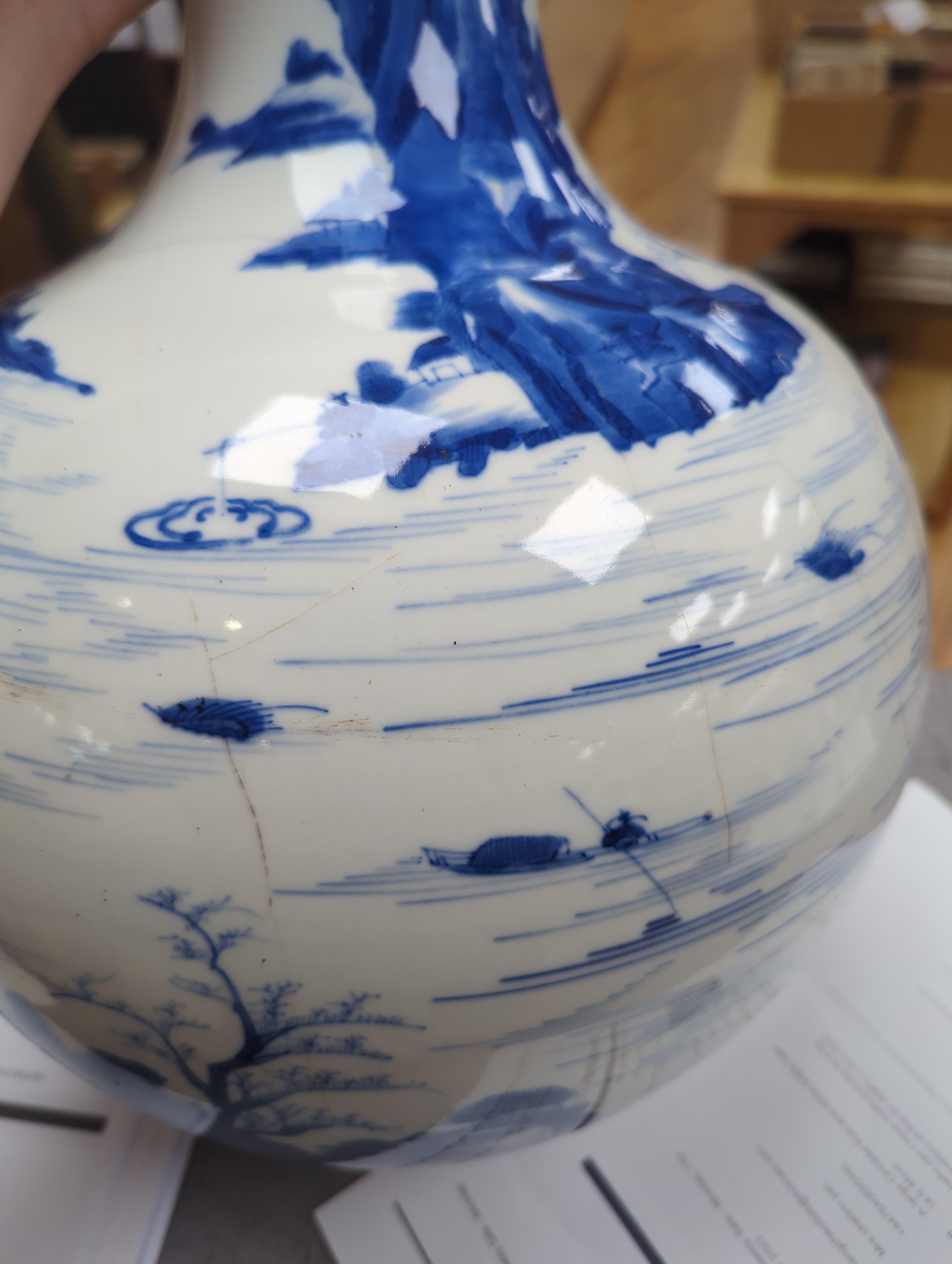 A large Chinese blue and white bottle vase, (a.f) 45cm